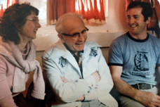 Pioneer missionary Percy Wills laughing with younger missionaries.