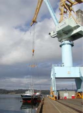 Big crane at Esquimalt lifts the Coastal Messenger.
