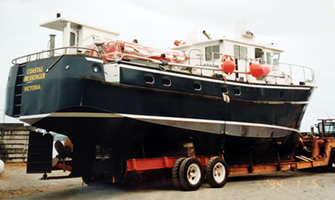 Sideview of Coastal Messenger on trailer.