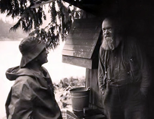 Percy Wills visiting in his raingear.