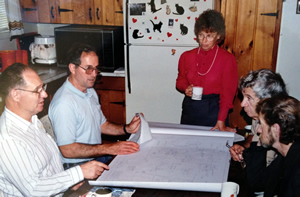Going over plans before pilothouse construction.